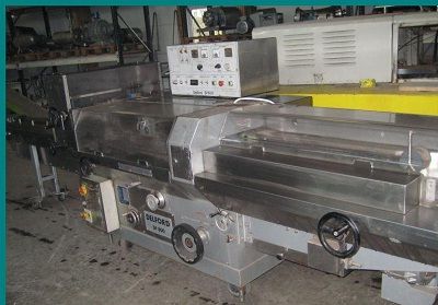 Delford SP800 Max. Packs sizes: L 300 mm, W 200 mm, H 120 mm, Girth 420 mm Flowpack Wrapping Machine