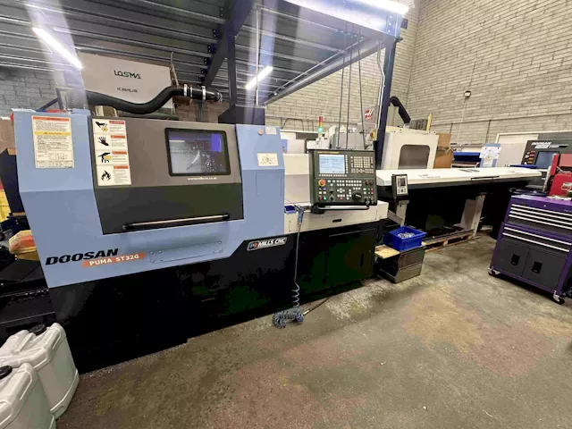 Doosan Fanuc     Model: Series 31i-Model B 8000 rpm 1/MIN Puma ST32G 7 Axis