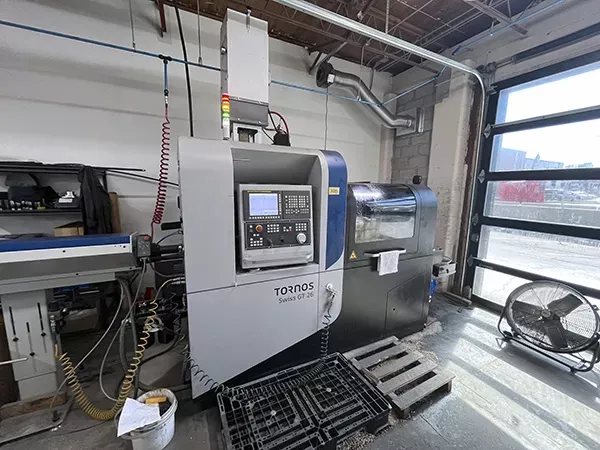 Tornos Fanuc 31iB control 10,000 GT-26/6 8 Axis
