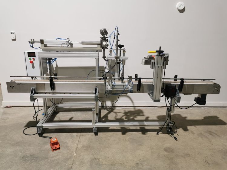 Atkin Inline filler with bag sealer