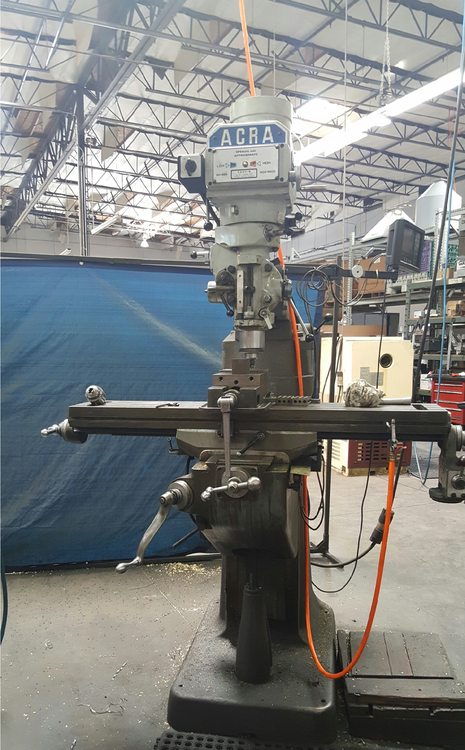 Acra Custom: Bridgeport vertical knee mill base with an Acra head