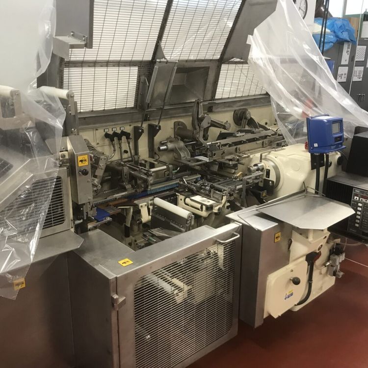 Sig DST  2 stage bar wrapping machine