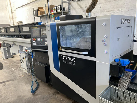 Tornos Fanuc Corporation Series 31i-Model B 10000 rpm SA DT 26/5 7 Axis