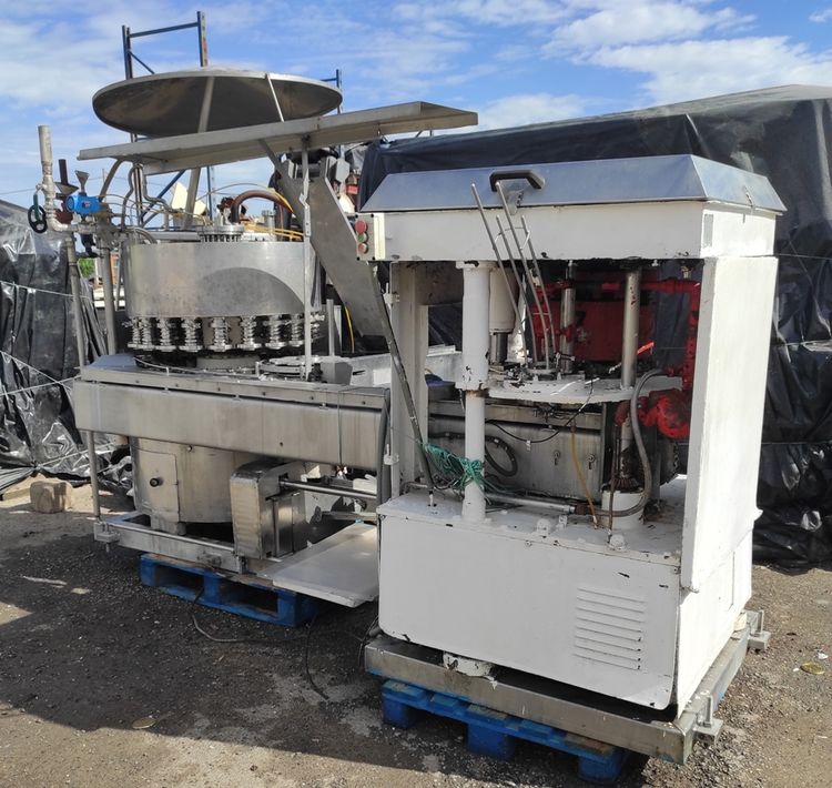 FMC FMC AUTOMATIC CAN SEAMER WITH 4 SEAMING HEADS AND 21-VALVE VACUUM ...