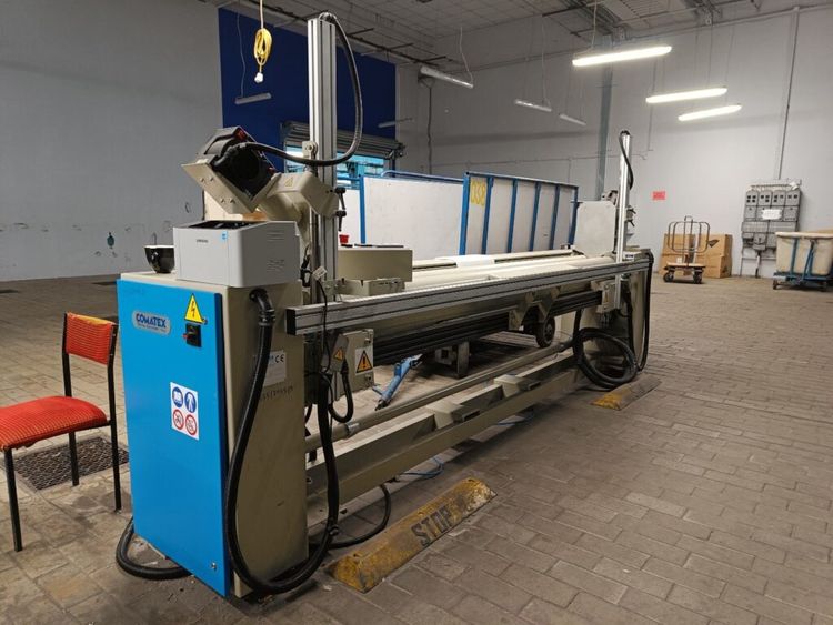 Comatex fabric roll wrapping machine
