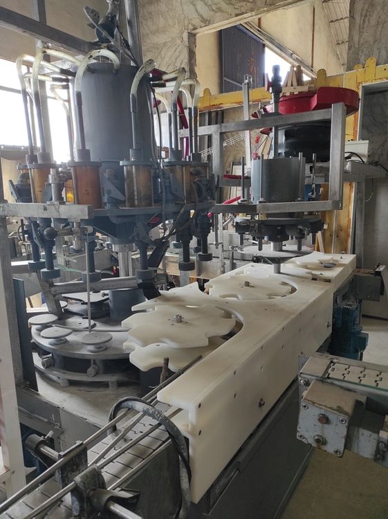 12-Valve filling machine for corrosive substances (bleach) with detergent dosing machine and capping machine