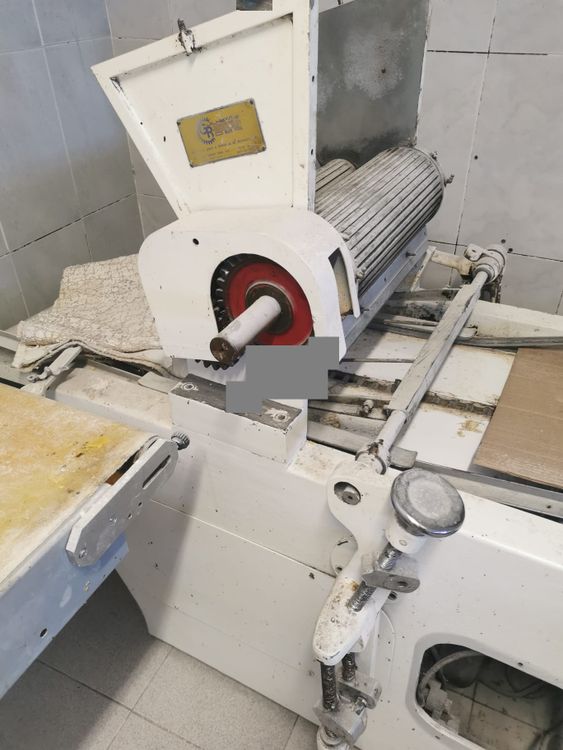 Rotary biscuit forming machine